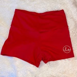 Ryderwear X Lauren Simpson red scrunch booty shorts